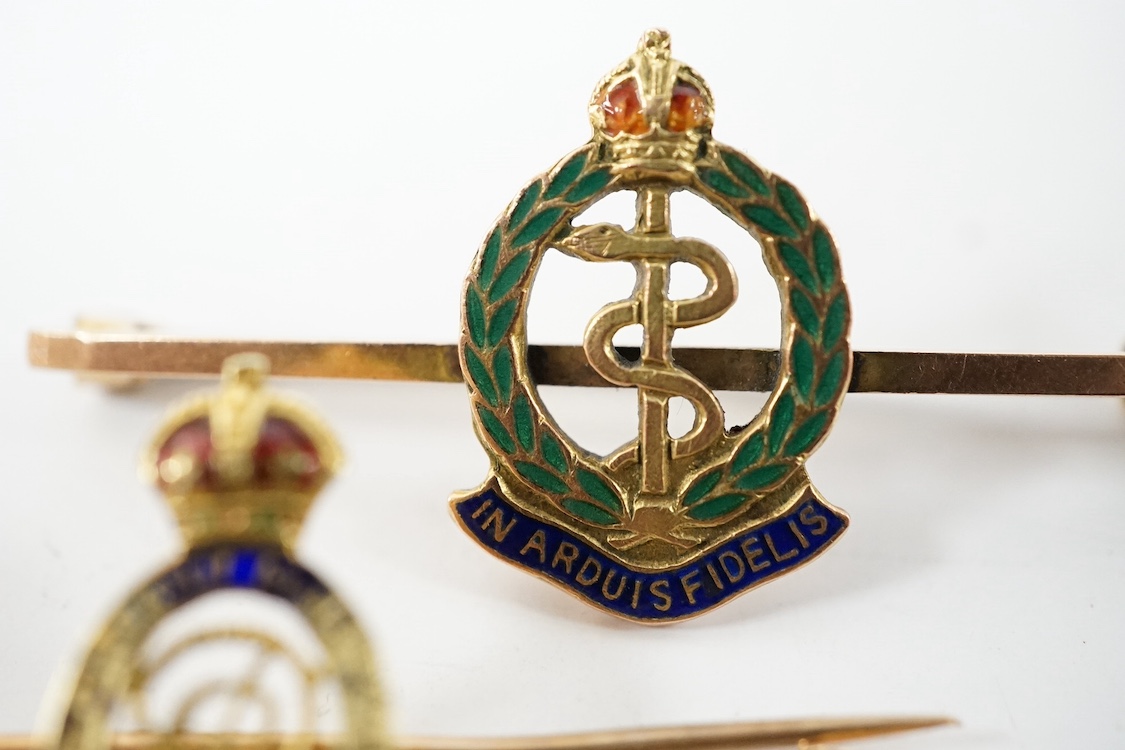 Two WWII sweetheart brooches; a RAMC brooch stamped 9ct.(?) and another badge stamped 15ct. Condition - poor to fair, damage to the enamel.